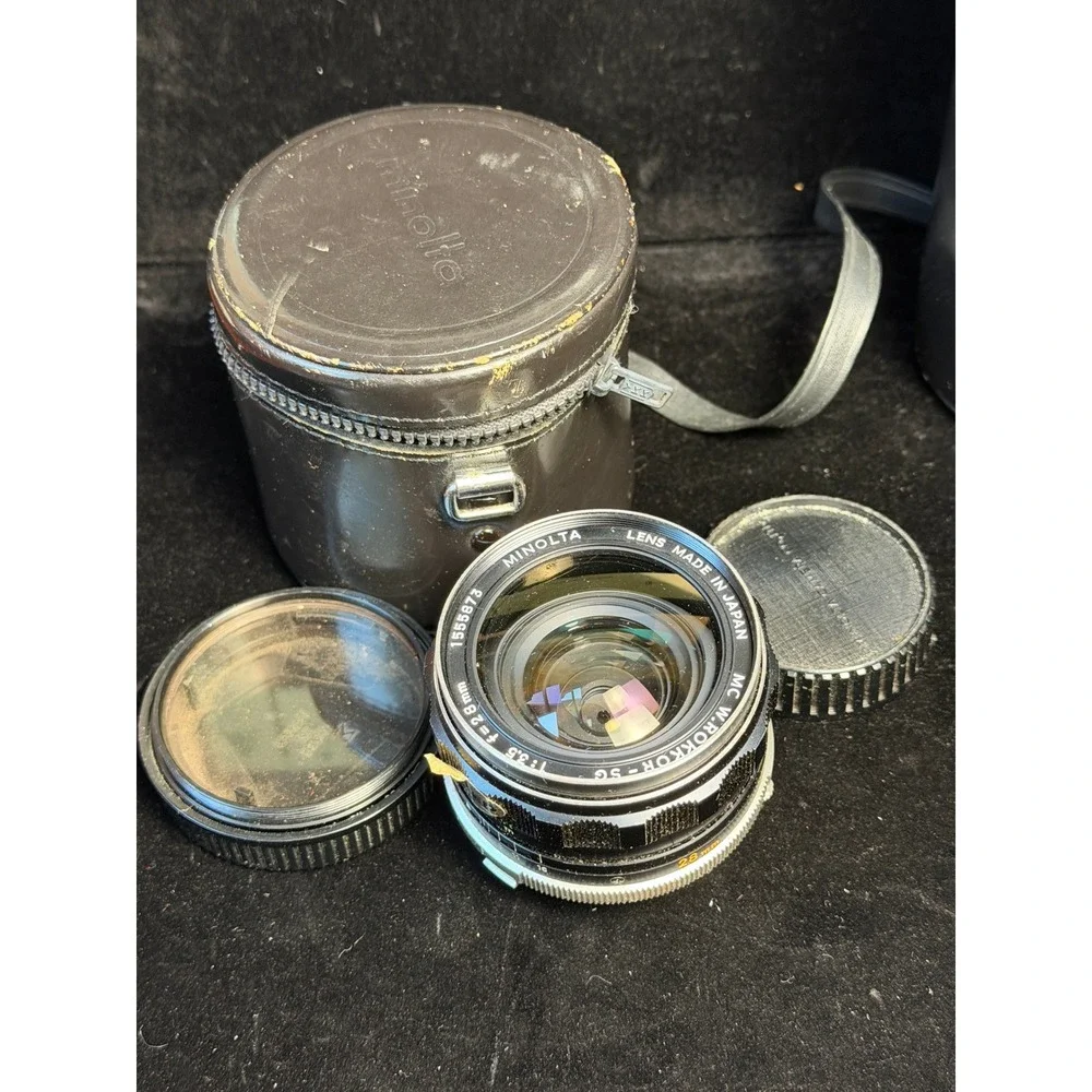Minolta SRT 101 35mm Film Camera: with 55mm, 28mm, 200mm Lenses, Cases and Strap